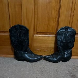 Black leather cowboy boots.